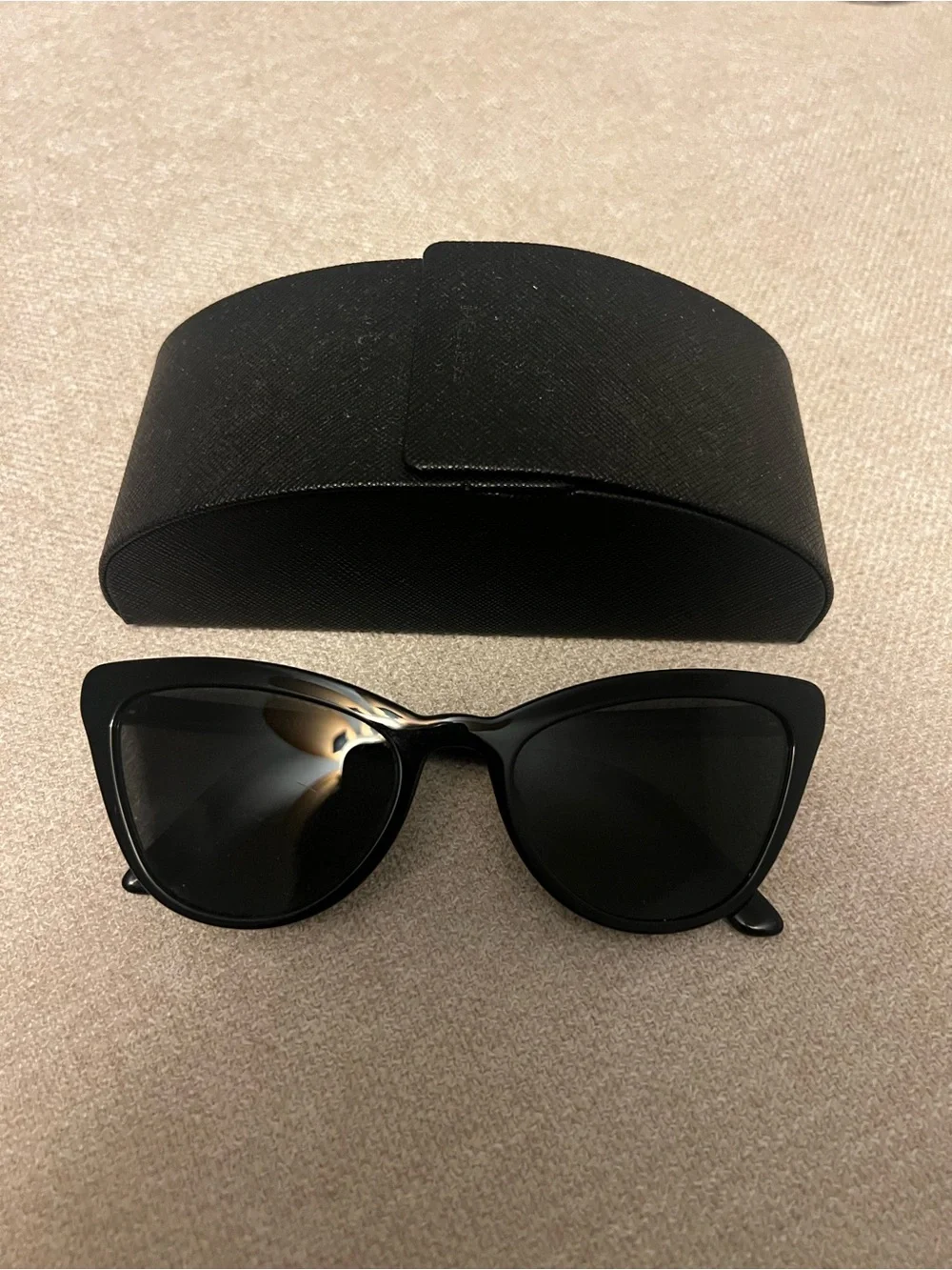 Prada Black Cat-Eye Sunglasses with Dark Lenses